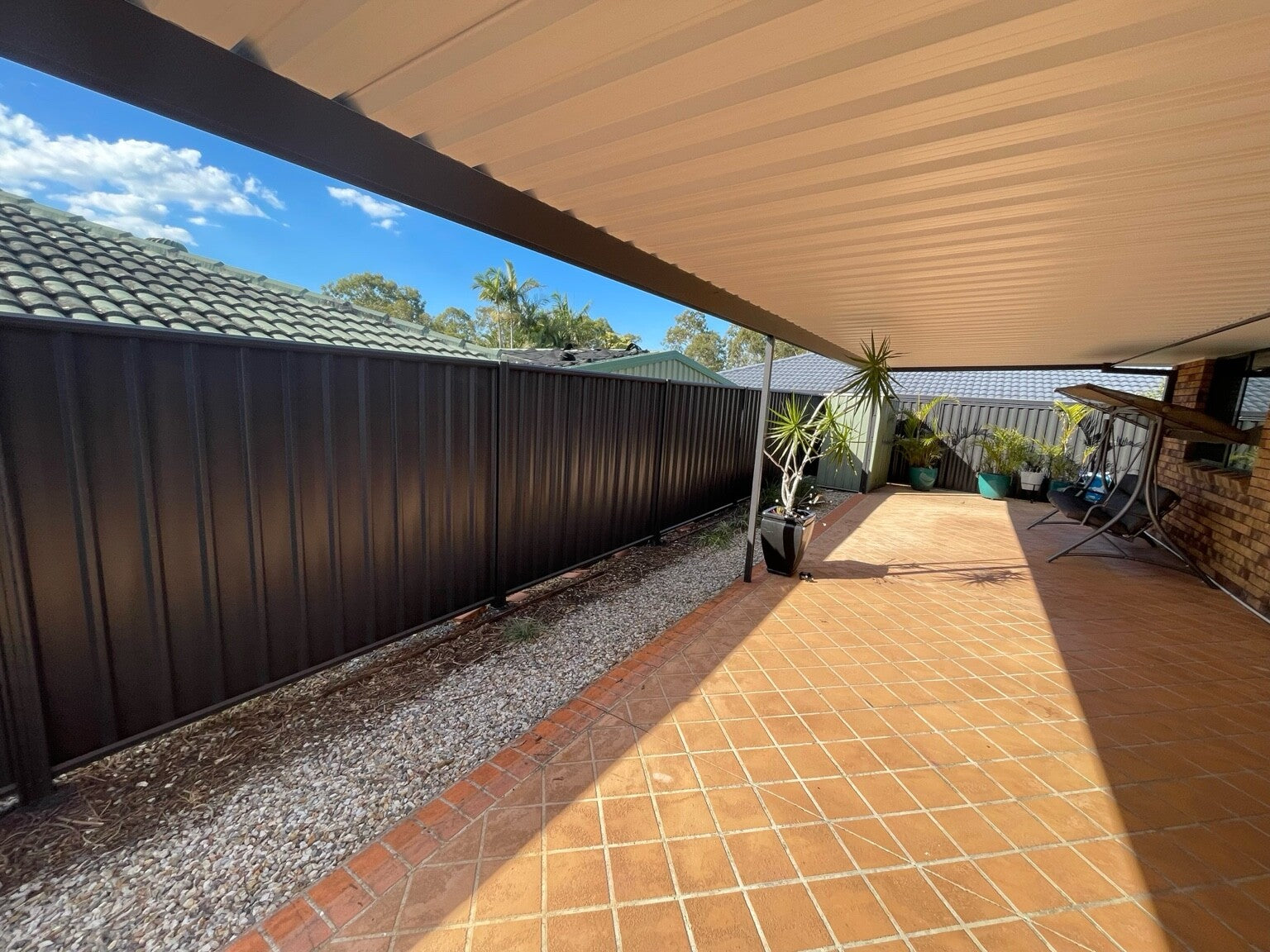 Completed residential fence and outdoor area by Superior Painting