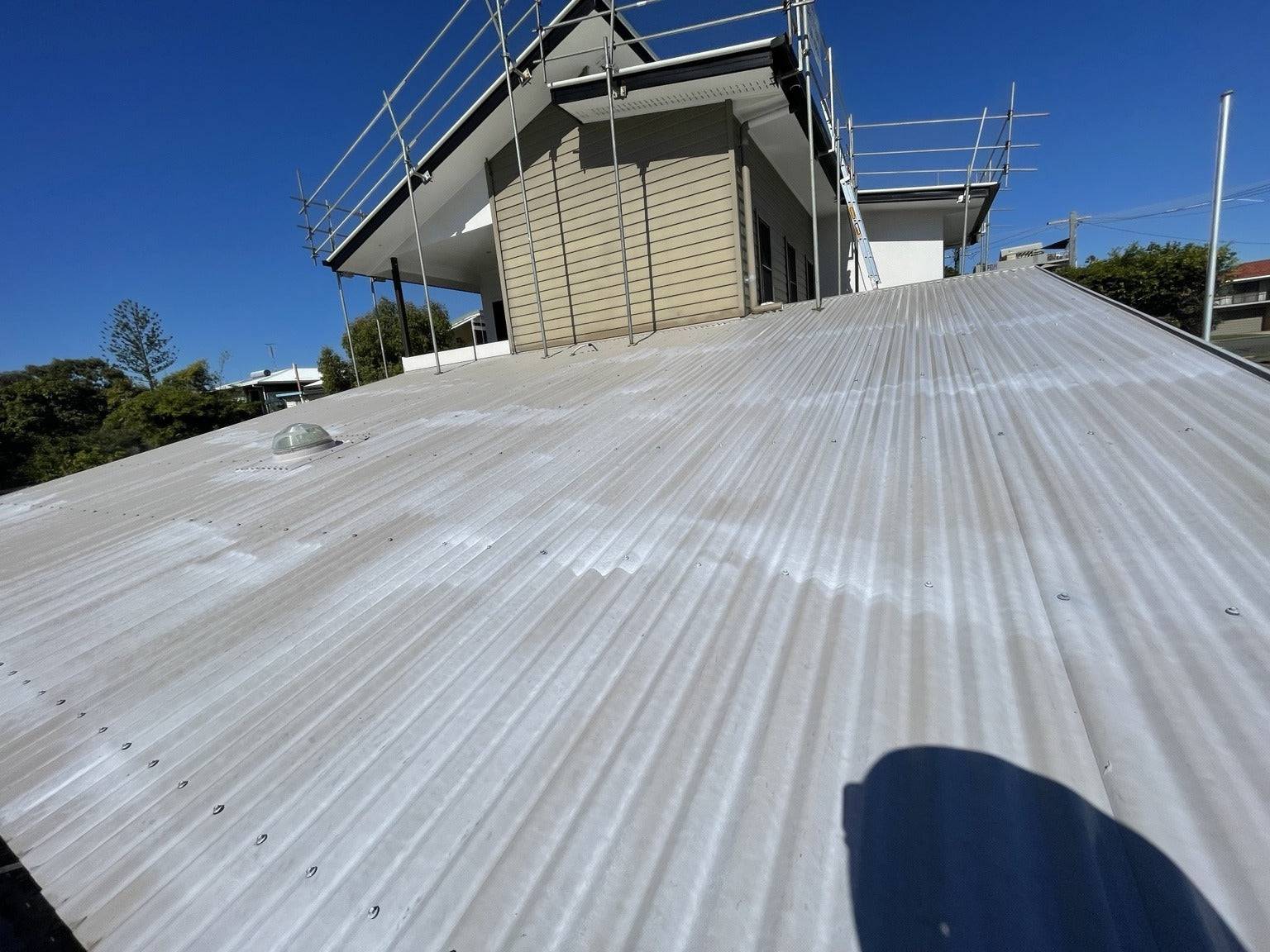 We determine what the existing roof surface requires