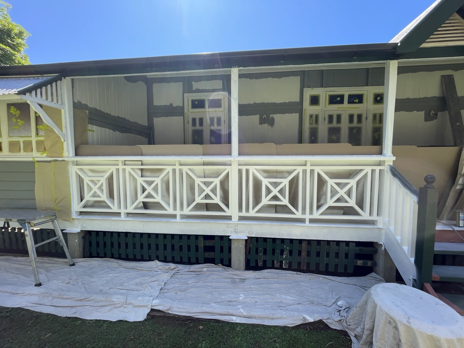 Balustrades and detailed timber receive the specified finishing system
