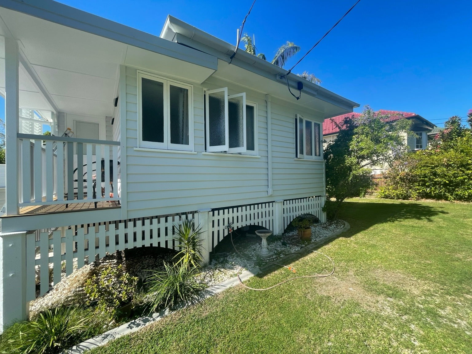 Weatherboard home repainted with care